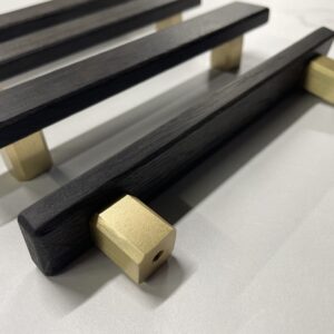 Bog Oak Cabinet handles with brass legs.