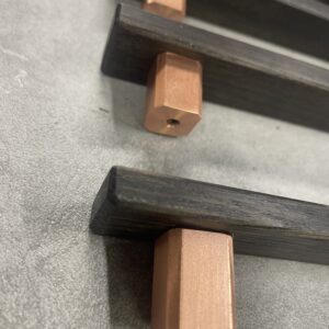 Bog Oak Cabinet handles with copper legs.